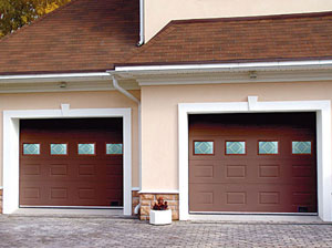 Способны ли секционные ворота утеплять гараж? 